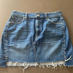 NWOT Jeans Denim Viper Mini skirt with staple embellishment.